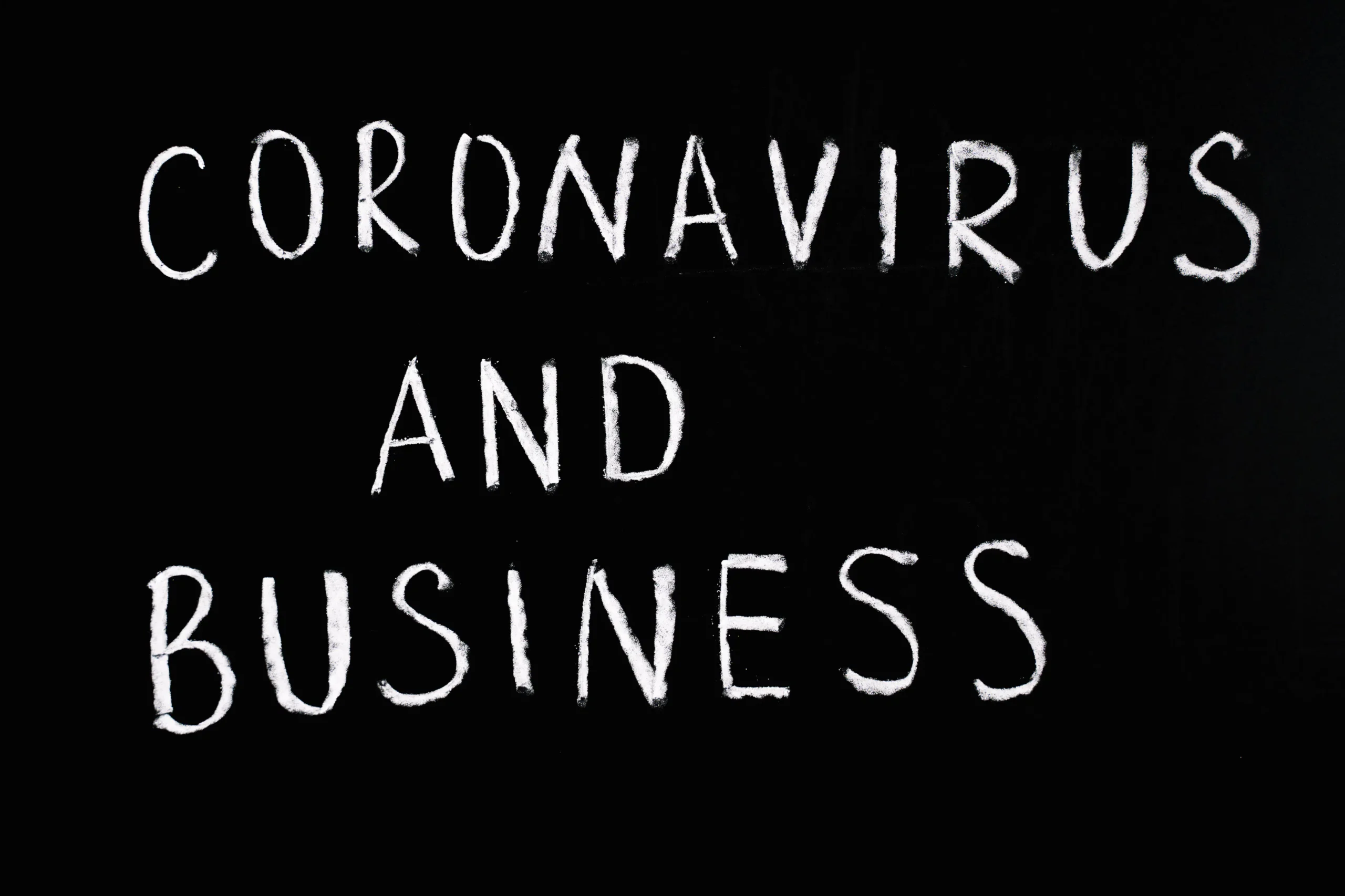 Image with the text 'Coronavirus and Business' suggesting the impact of global events on business practices, which could be addressed in ESG training courses and ESG reporting courses to ensure business resilience and sustainable practices.